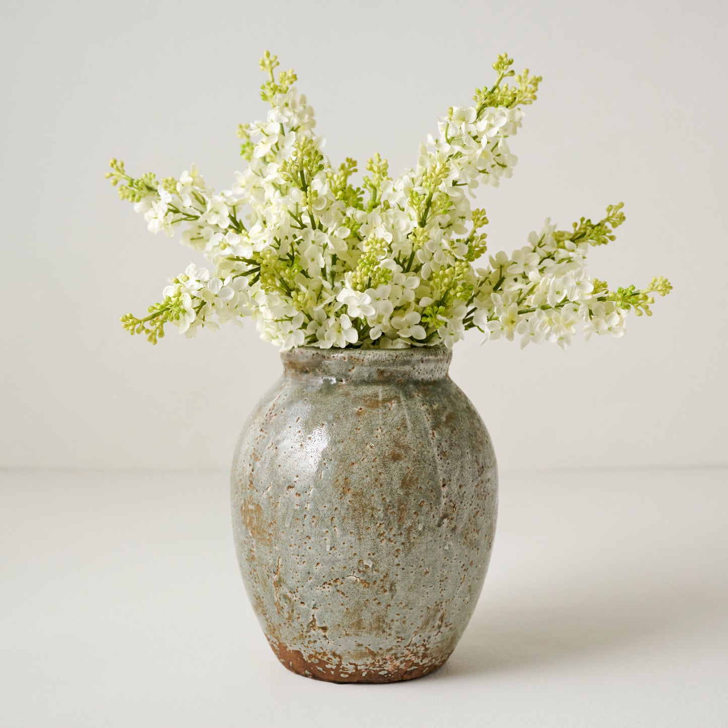 White Lilac Bundle shown in vase