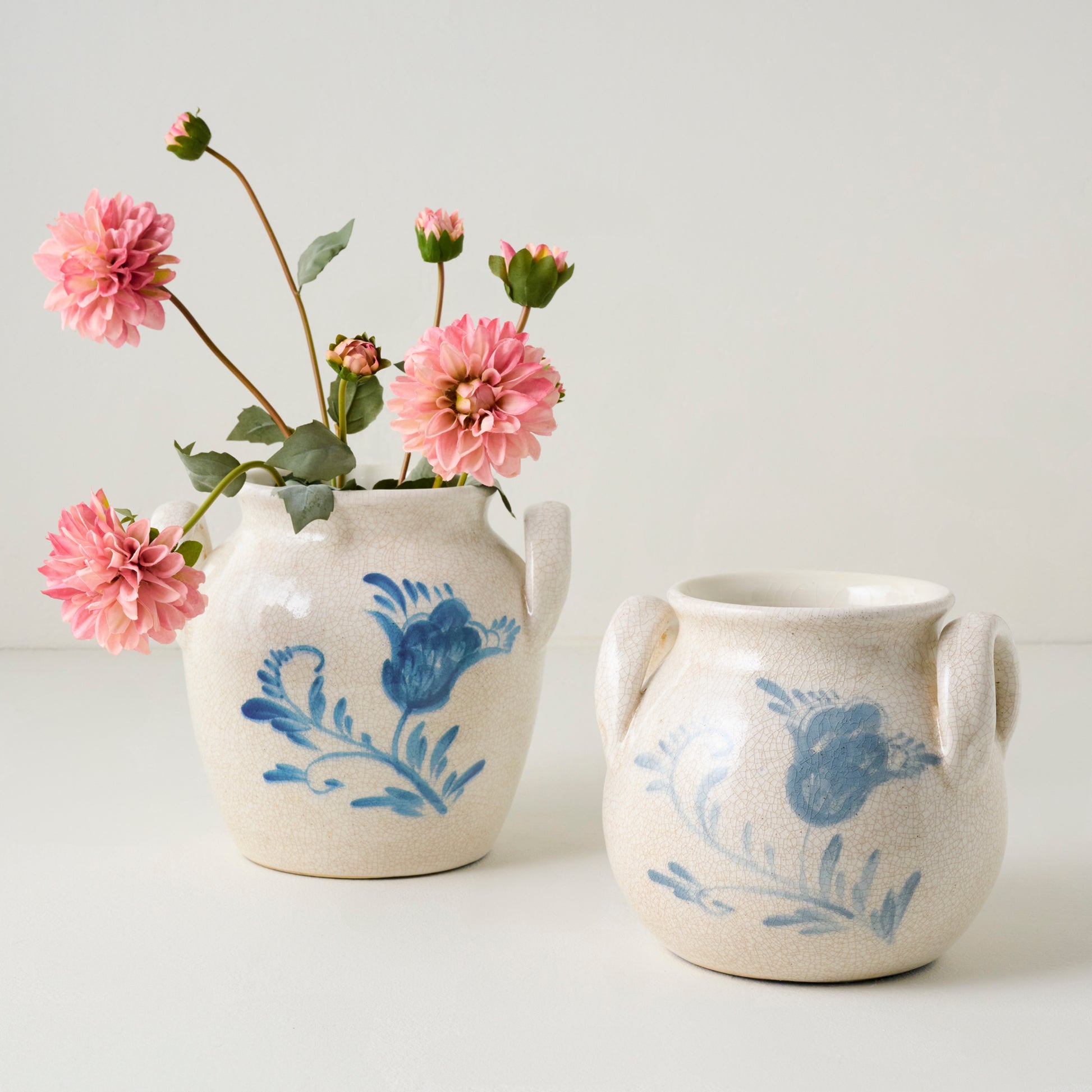 Caroline Blue Hand-Painted Vase shown with other Caroline case and florals