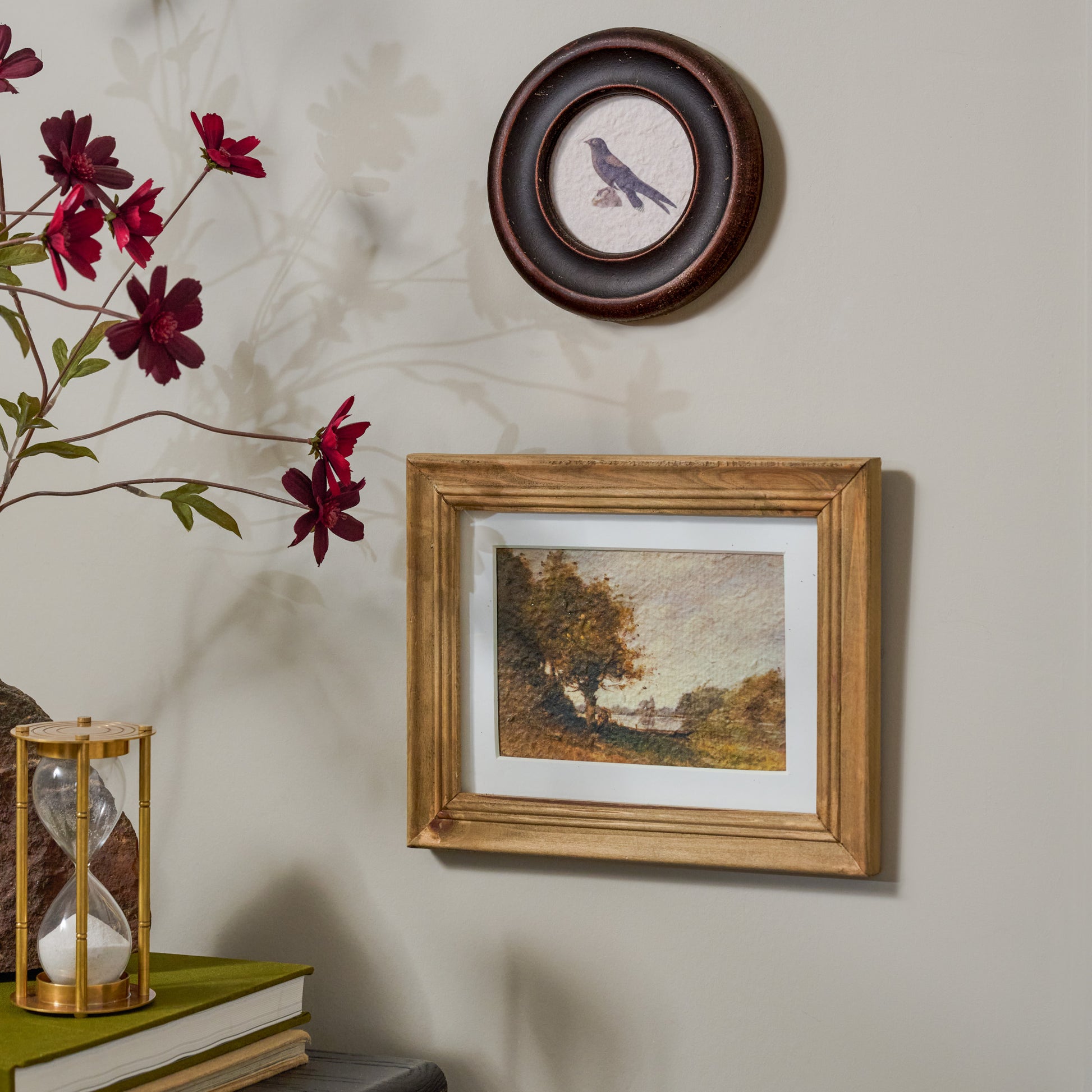 Vintage Framed Bird Print shown styled on wall with other decor