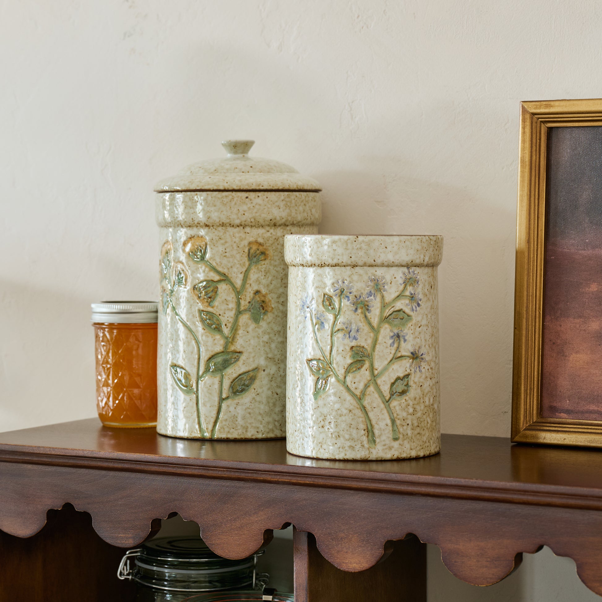 Blue Wildflower Canister shown with another canister on shelf