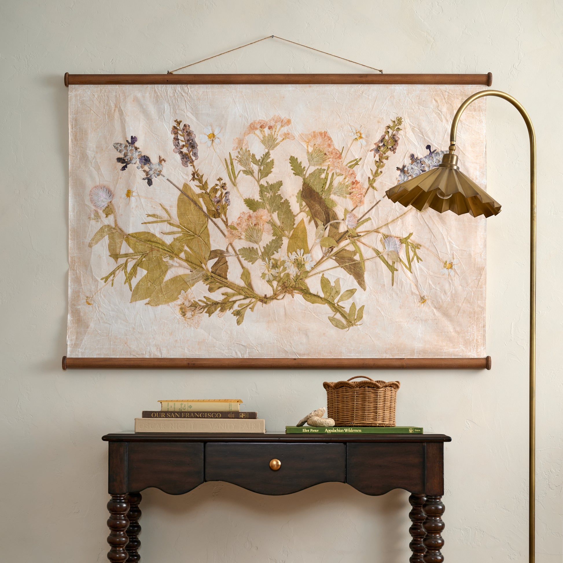 Jo's Hand Pressed Herbarium Tapestry - Seasonal Symphony on a wall above console table