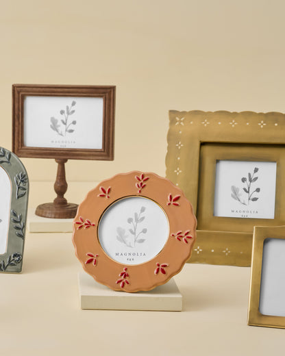 Rustic clay Round Ceramic Juliet Photo Frame shown with other frames