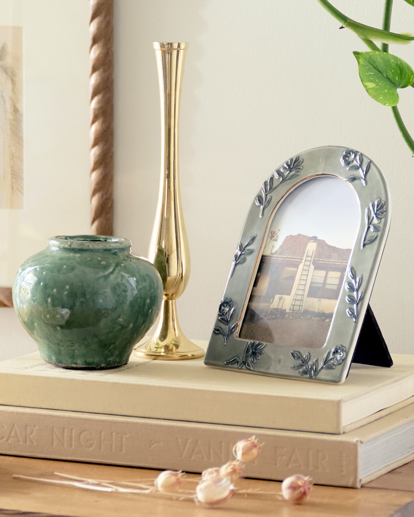 4x6 Ceramic Arched Floral Photo Frame shown with other decor