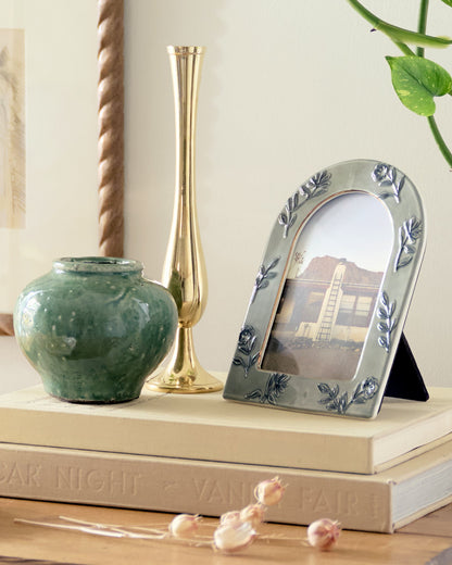 4x6 Ceramic Arched Floral Photo Frame shown with other decor