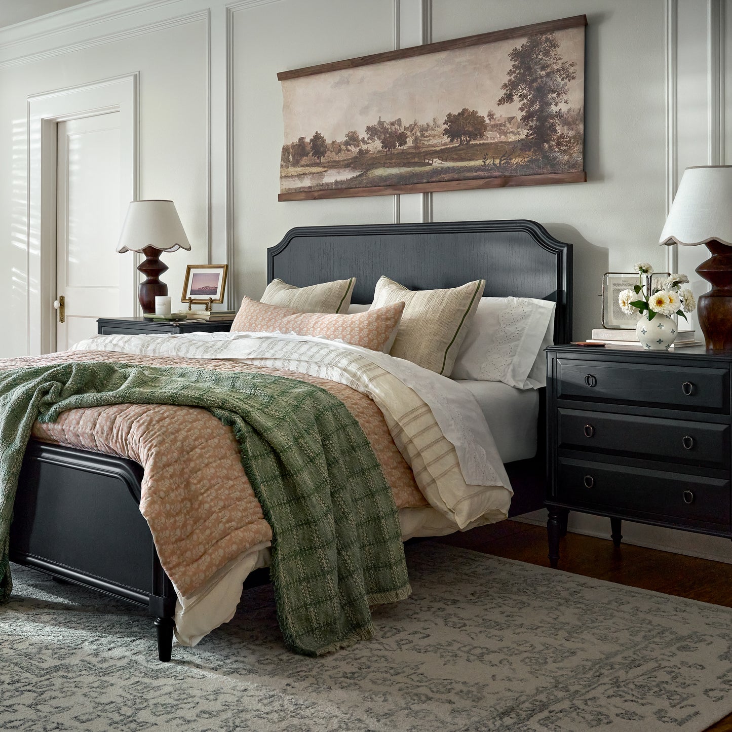European Countryside Tapestry shown hung above bed