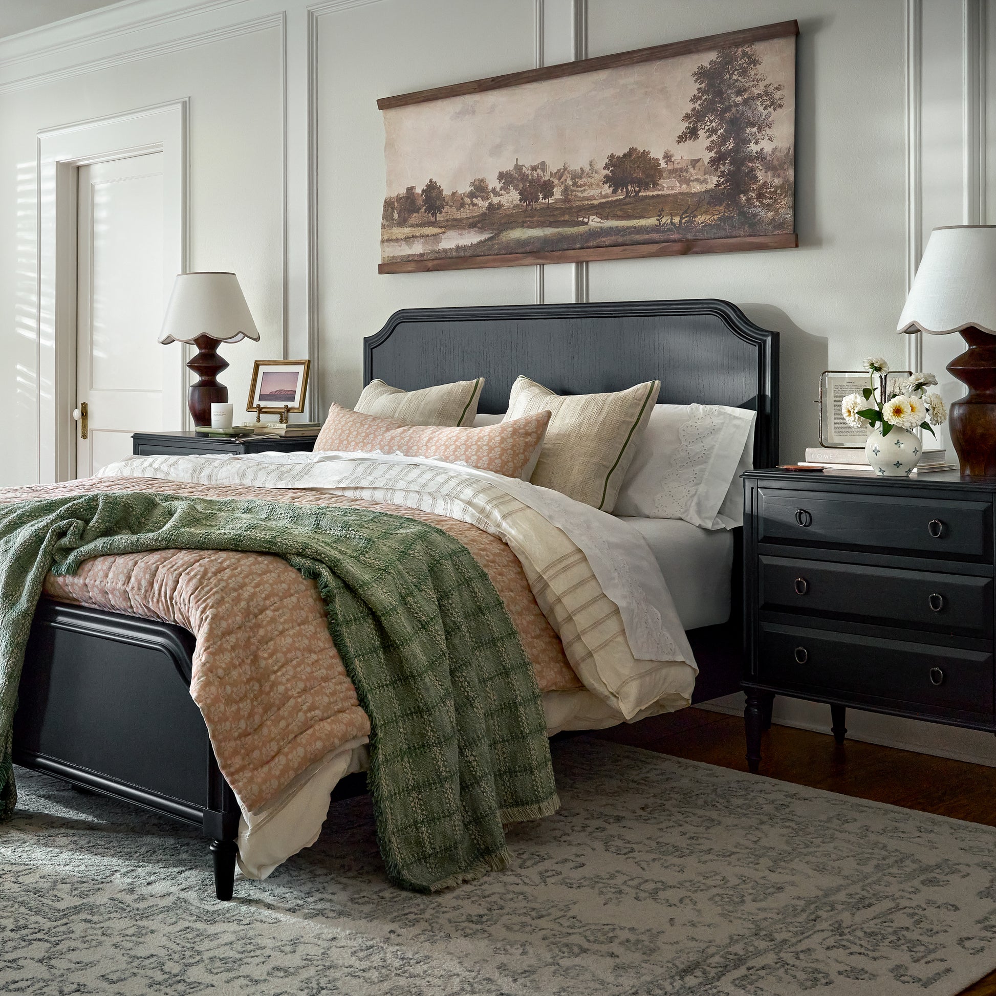 European Countryside Tapestry shown hung above bed