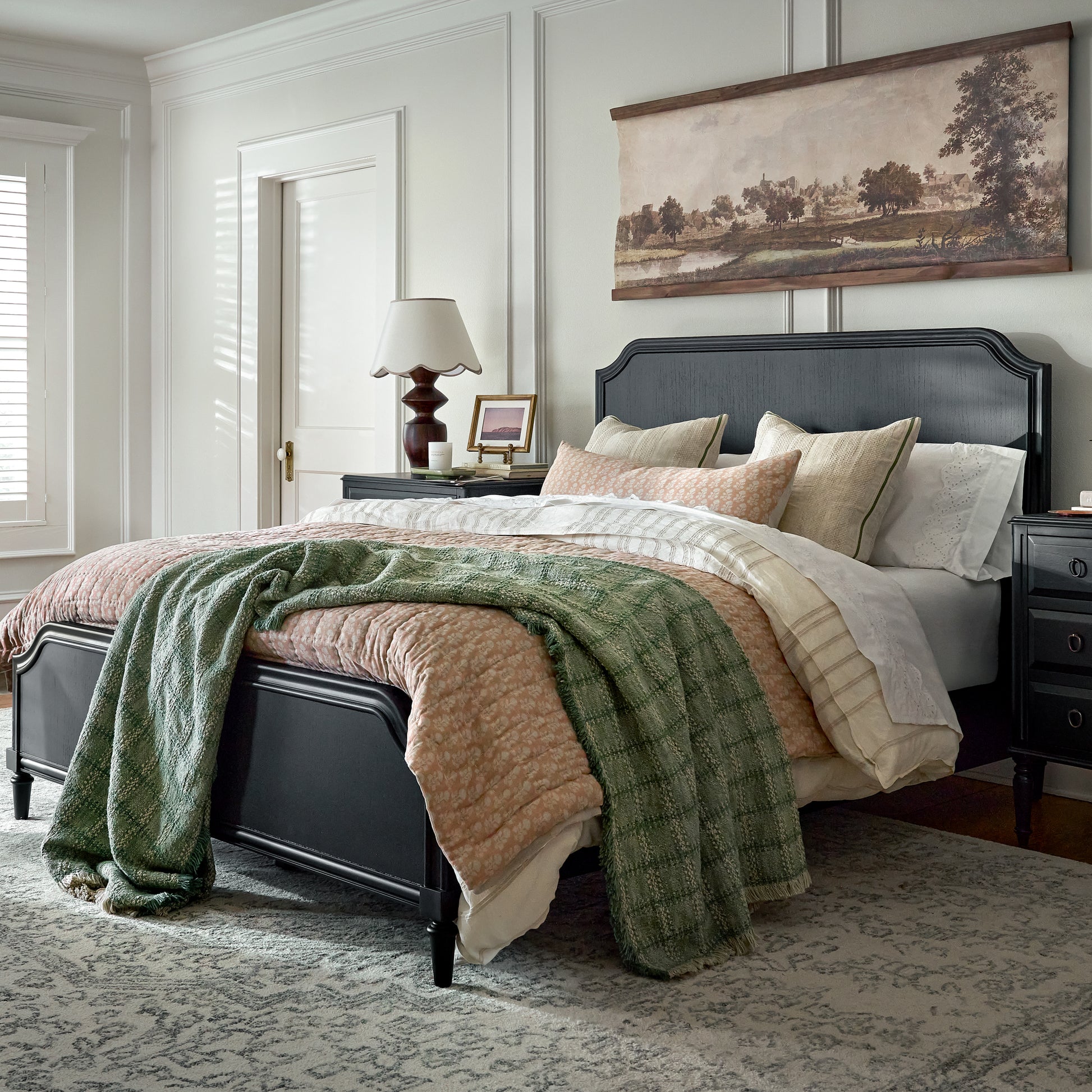 Ellie Block Print Quilt shown on bed