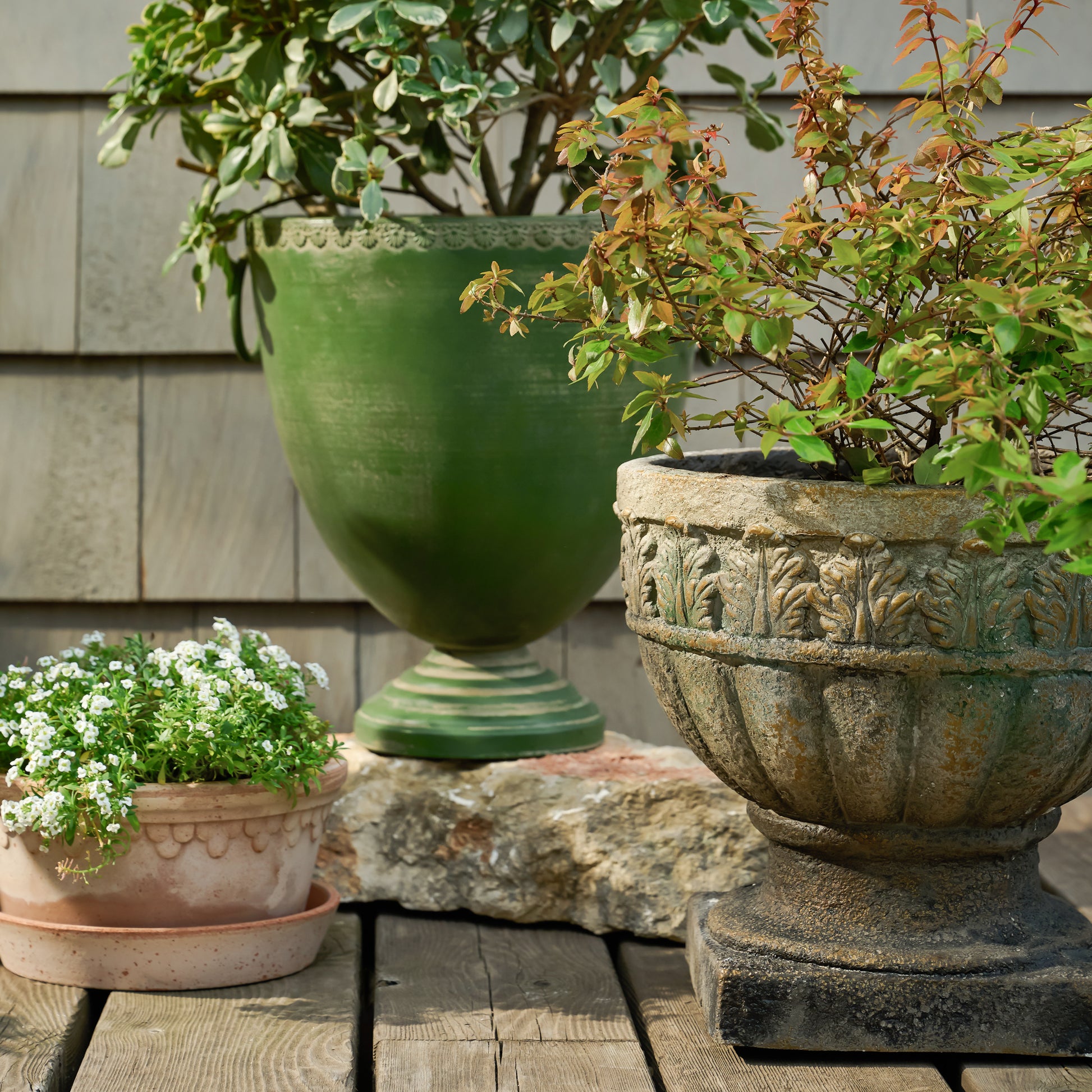 Green Aged Urn Vase shown outside