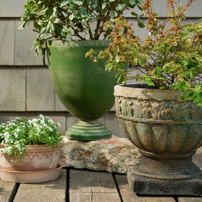 Green Aged Urn Vase shown outside
