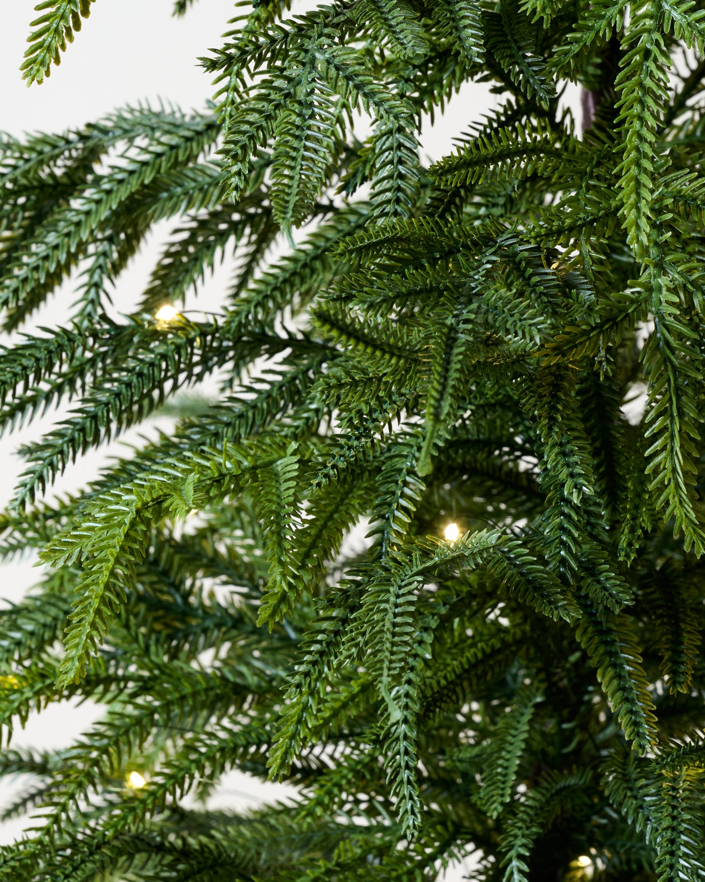 Real Touch Norfolk Pine Pre-Lit Potted Tree close up