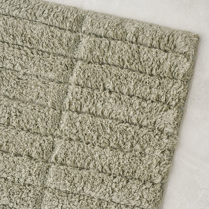 close up view of Eucalyptus Green Textured Bath Mat