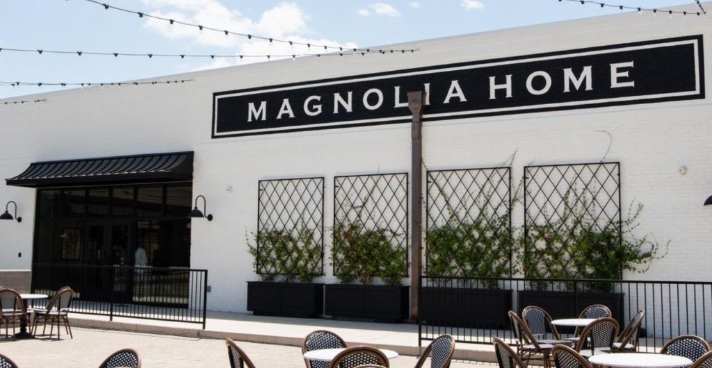 Magnolia Home store exterior with outdoor seating area