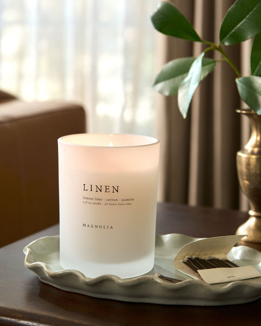 magnolia linen candle set on scalloped green tray