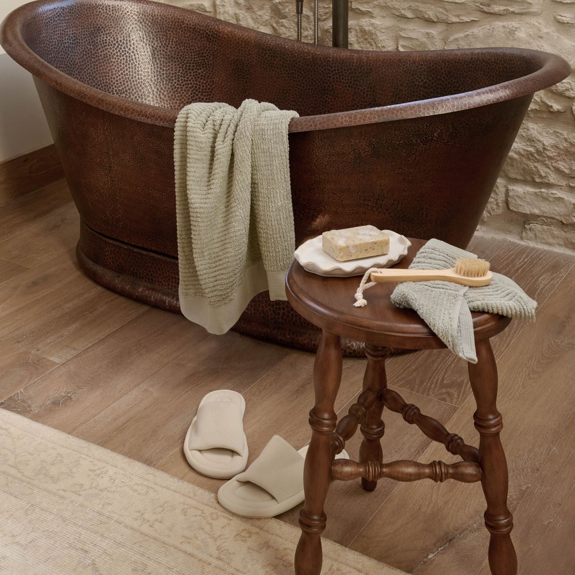 Lavinia Turned Short Leg Stool used as small table near bathtub