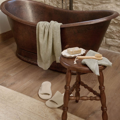 Lavinia Turned Short Leg Stool used as small table near bathtub