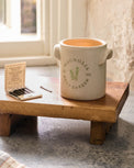 Magnolia Herb Garden Candle set on wooden riser