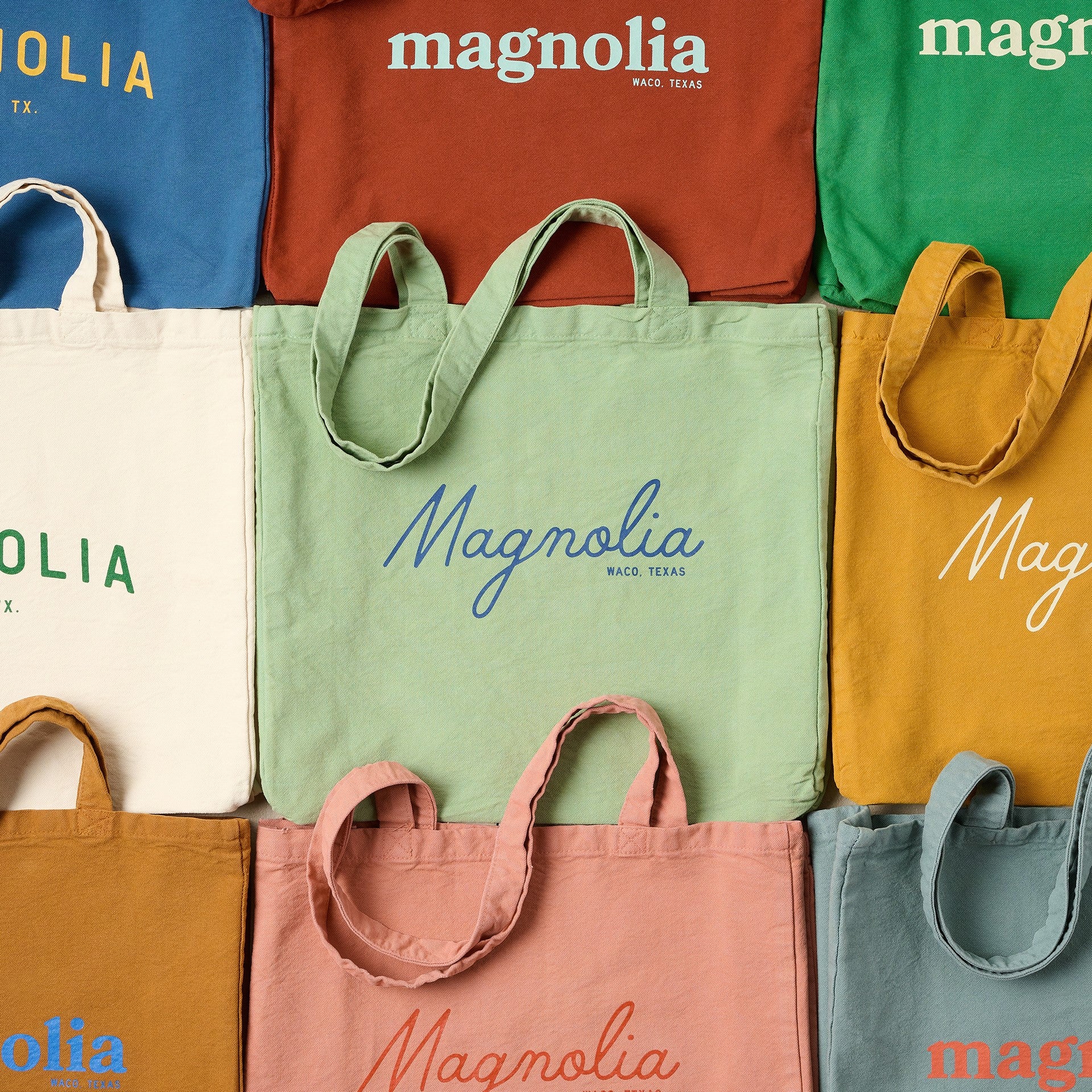 Magnolia totes in various colors