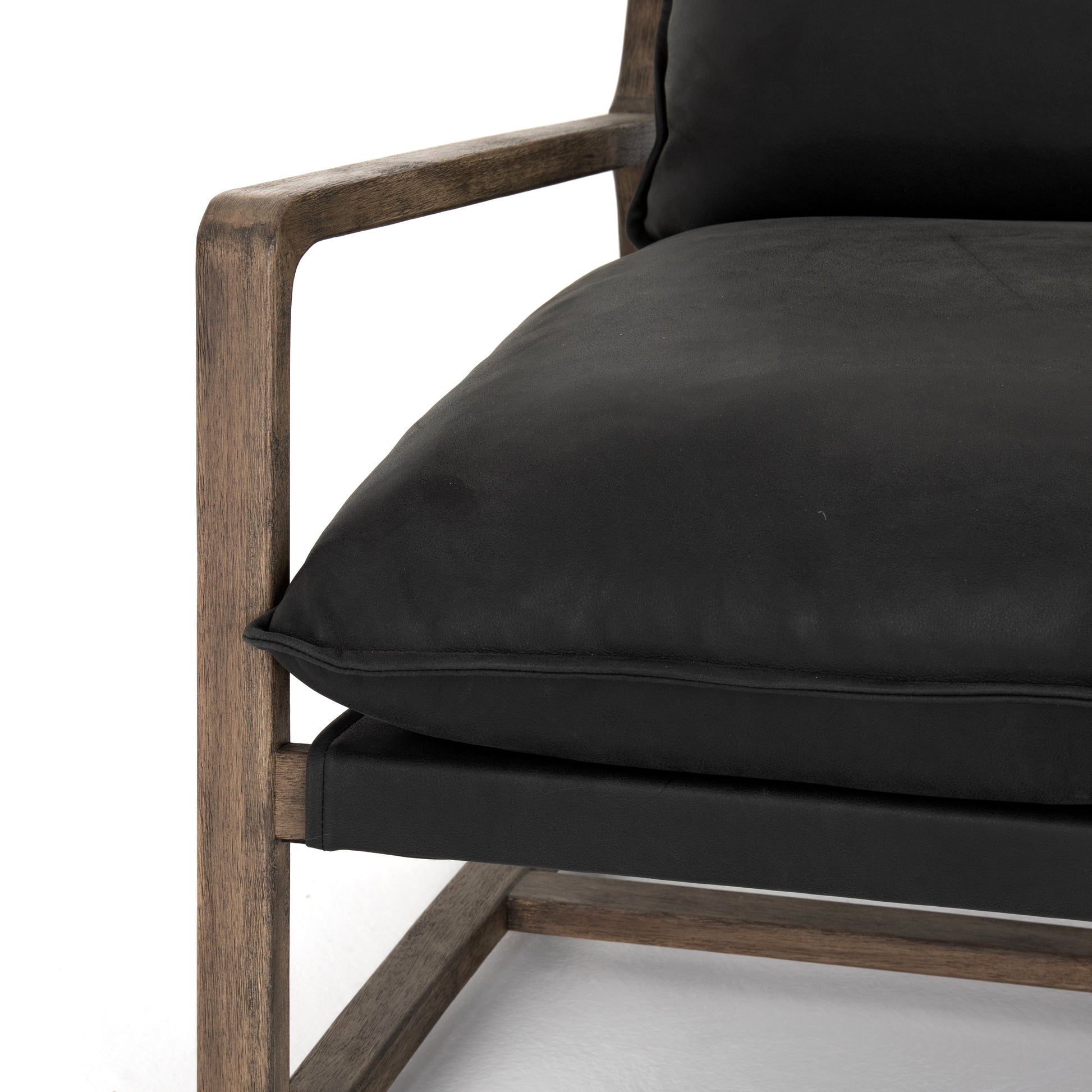 black leather arm chair with wooden show frame
