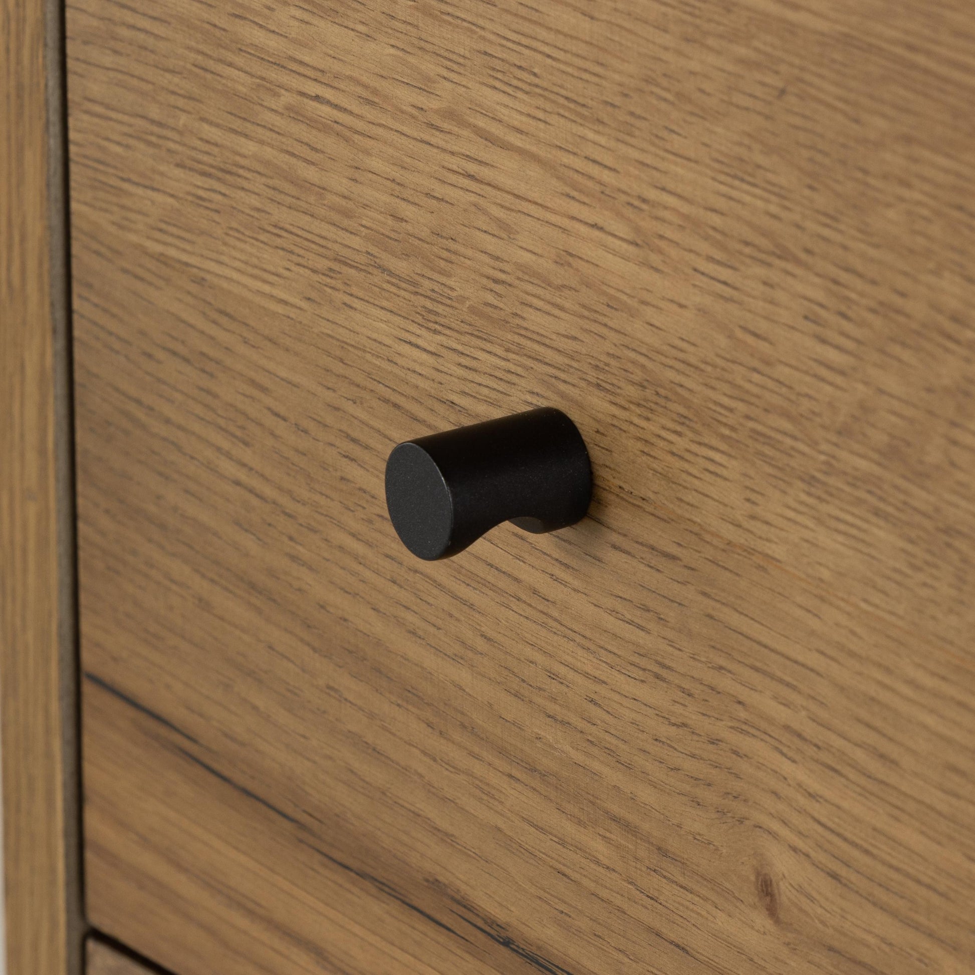 Liam Nightstand in amber oak close up of pull knobs