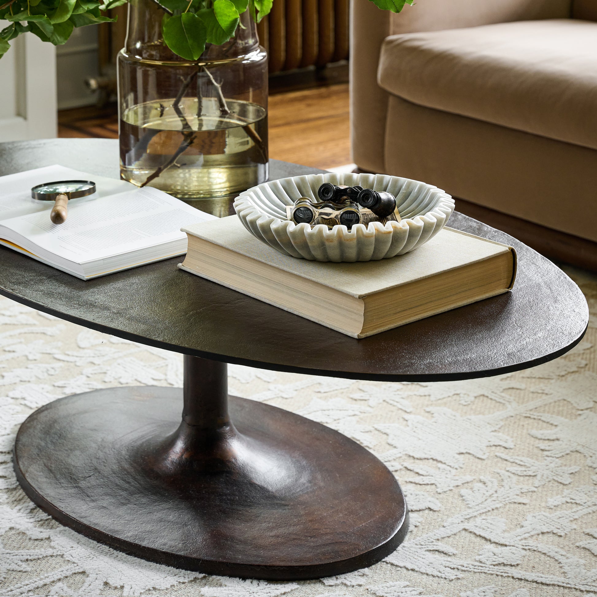 Gloria Natural Ivory Rug with coffee table and sofa