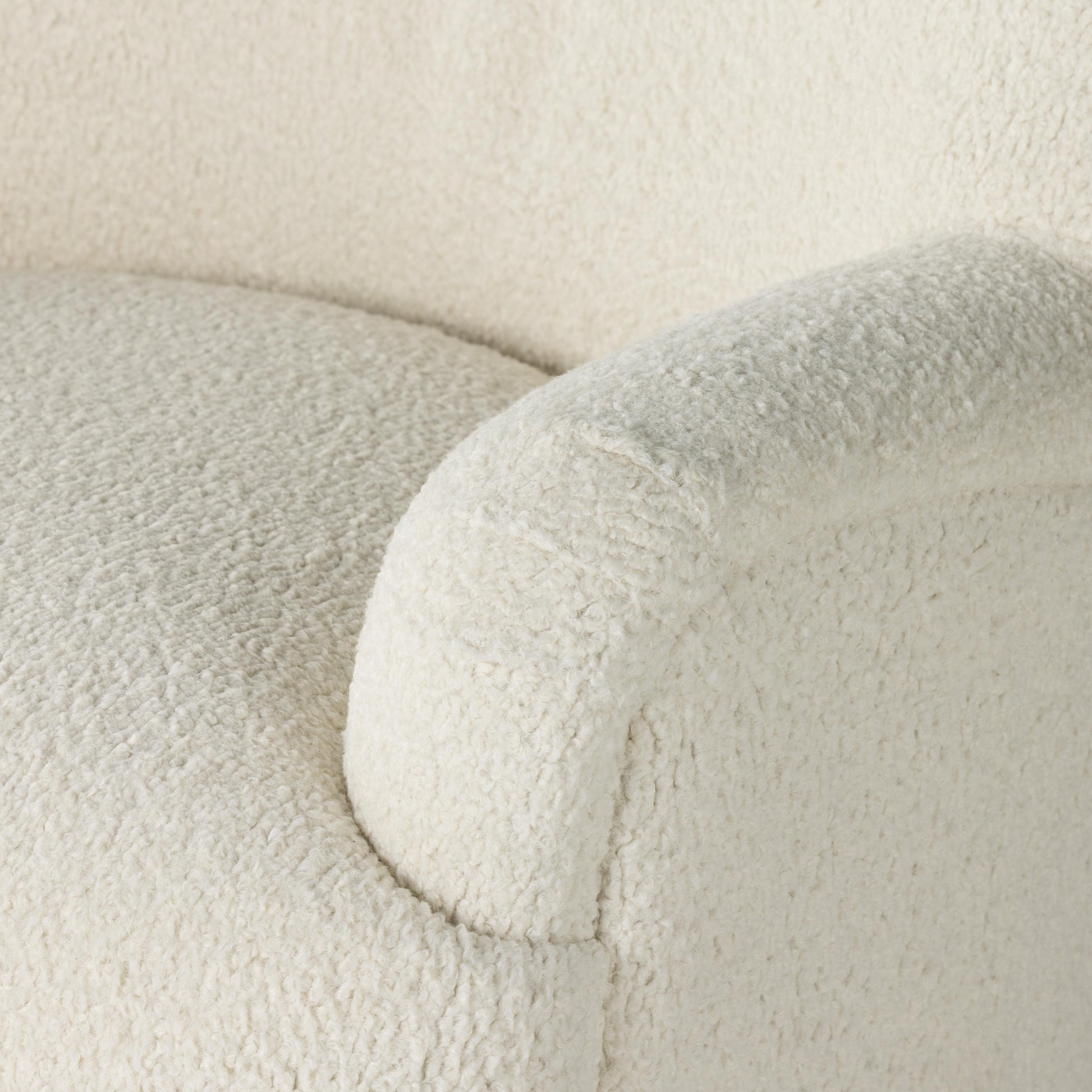 Ruby Swivel Chair in Almond close up of armrest