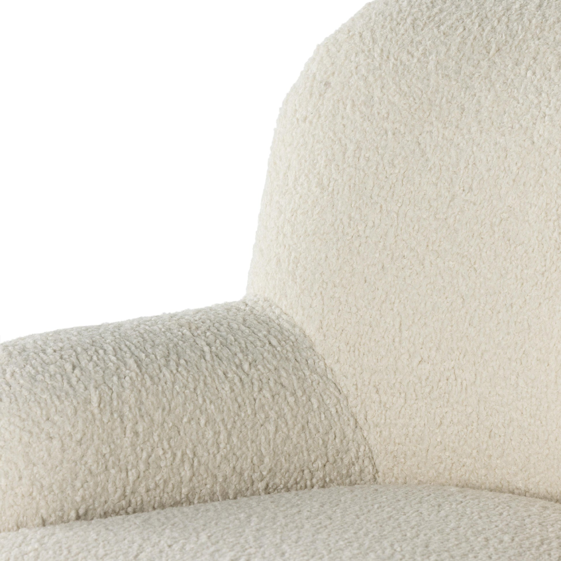 Ruby Swivel Chair in Almond close up of seat, armrest and back rest