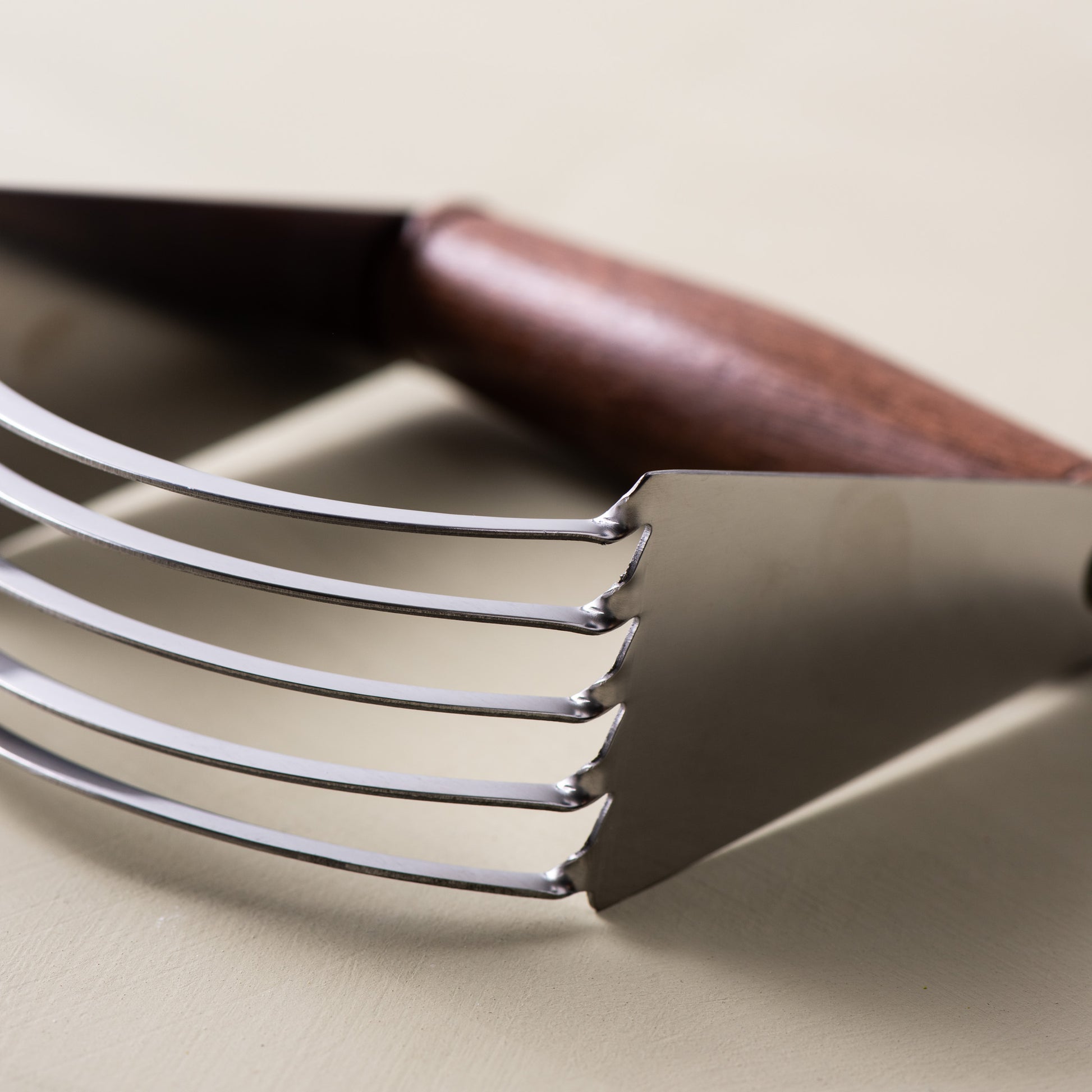 stainless steel pastry blender with walnut wood handle