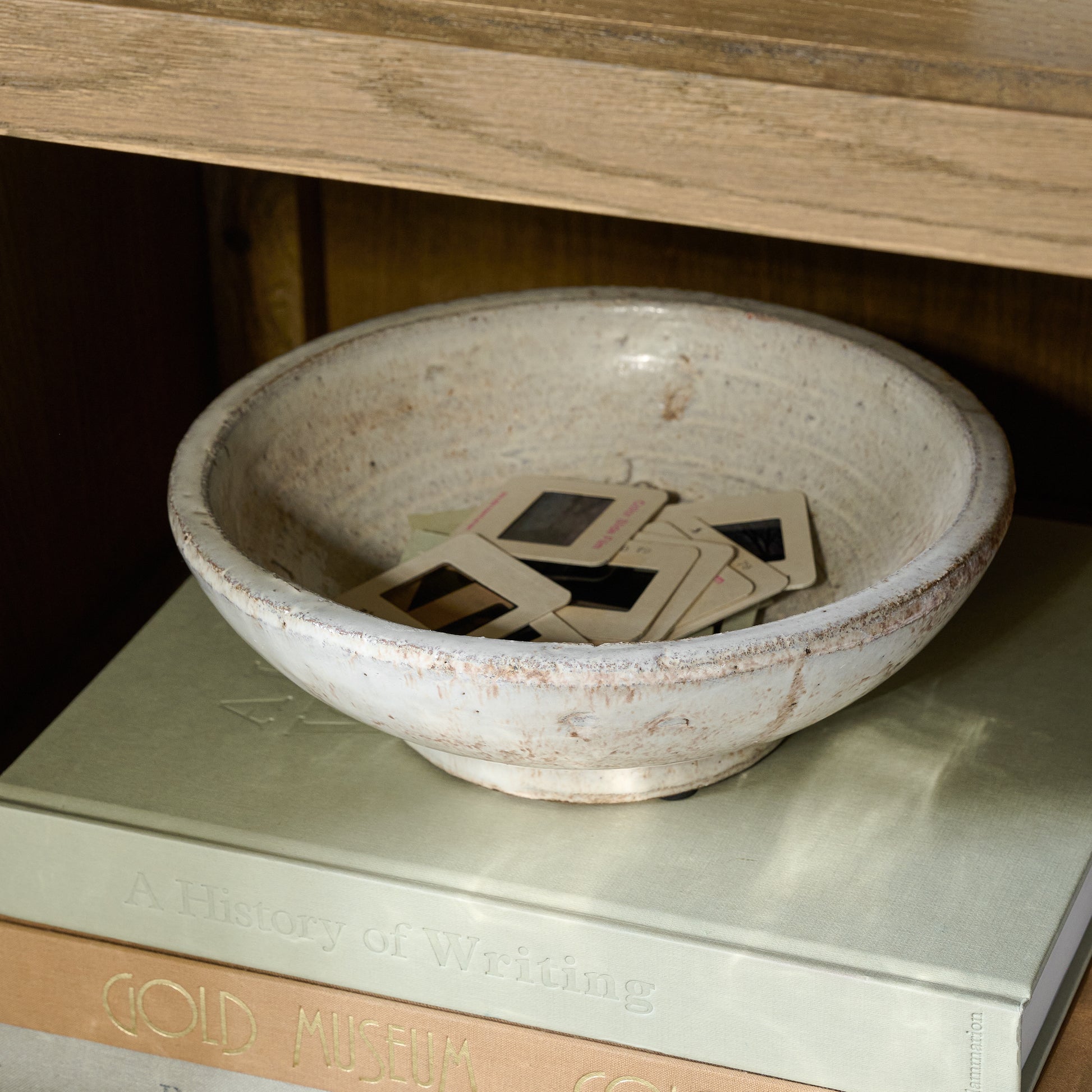 Rustic Cream Accent Bowl containing items