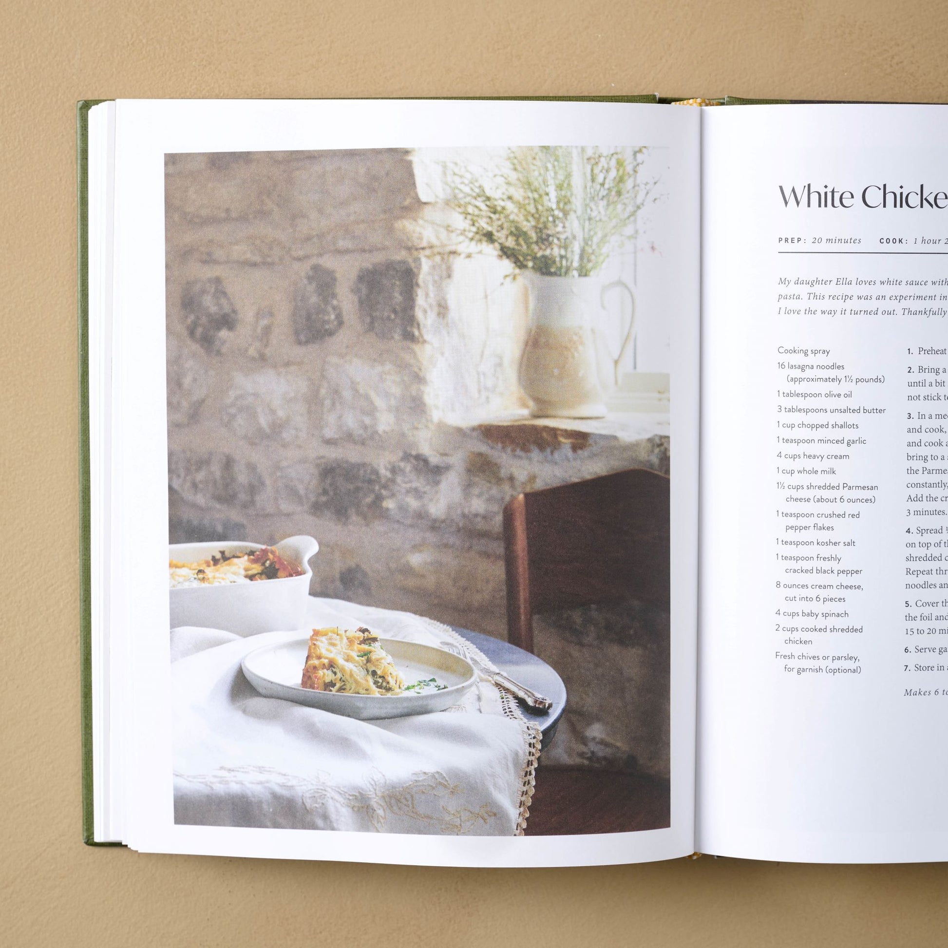 Joanna Gaines Magnolia Table Cookbook Volume 3 open to a page with a photo of quiche