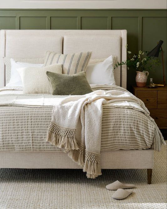 Shadow Grey + Oatmeal Stripe Linen Cotton Duvet on a made bed