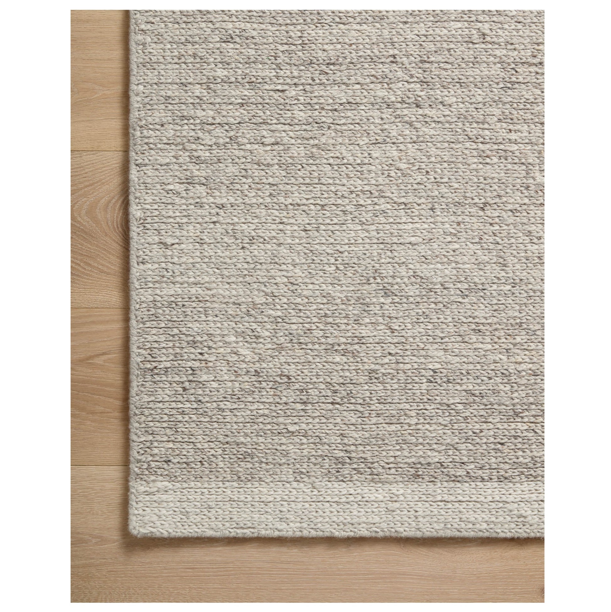 Ashby Silver Ivory Rug corner on wood floor