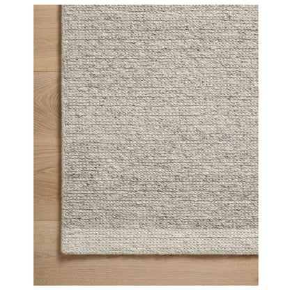 Ashby Silver Ivory Rug corner on wood floor