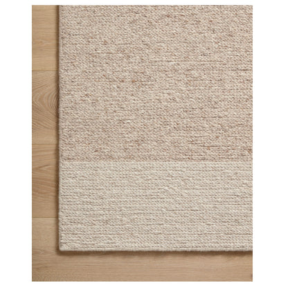 Ashby Oatmeal Natural Rug corner on wood floor