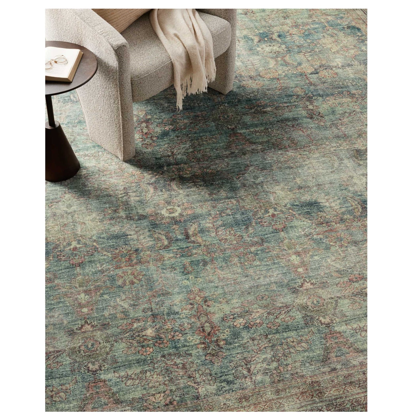 Banks Ocean Spice Rug under a chair