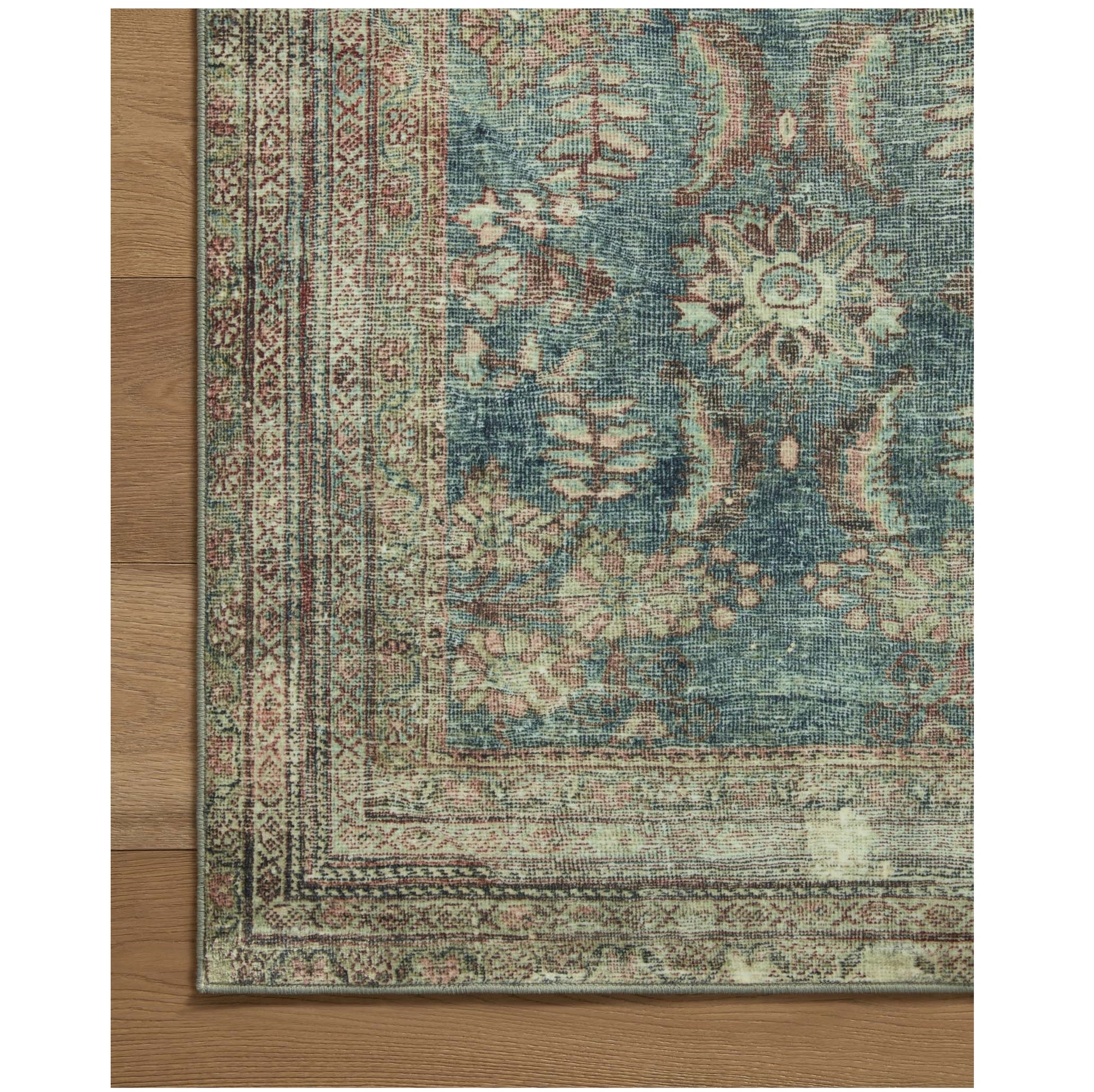 Banks Ocean Spice Rug corner on wood floor