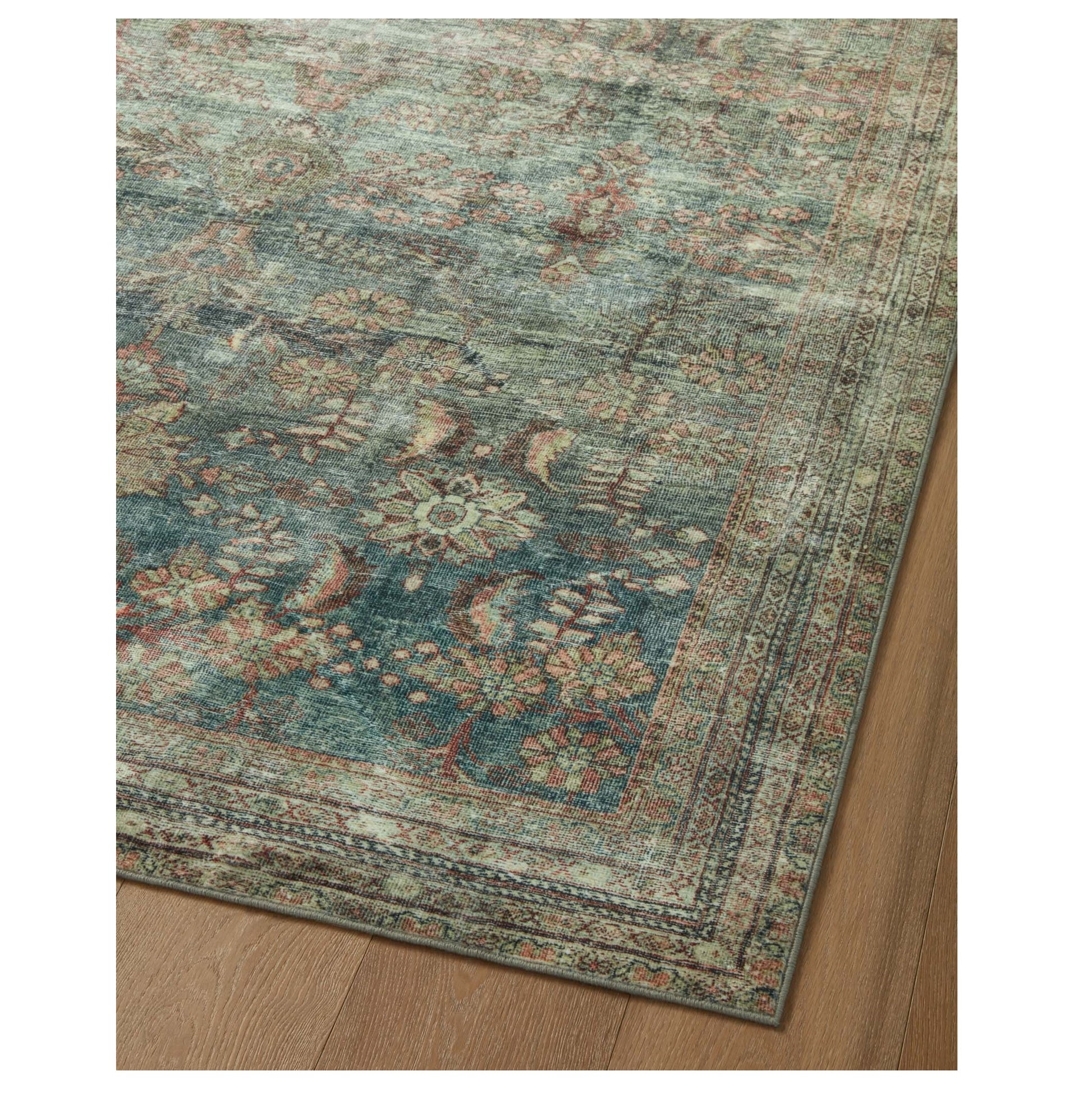 Banks Ocean Spice Rug corner on wood floor