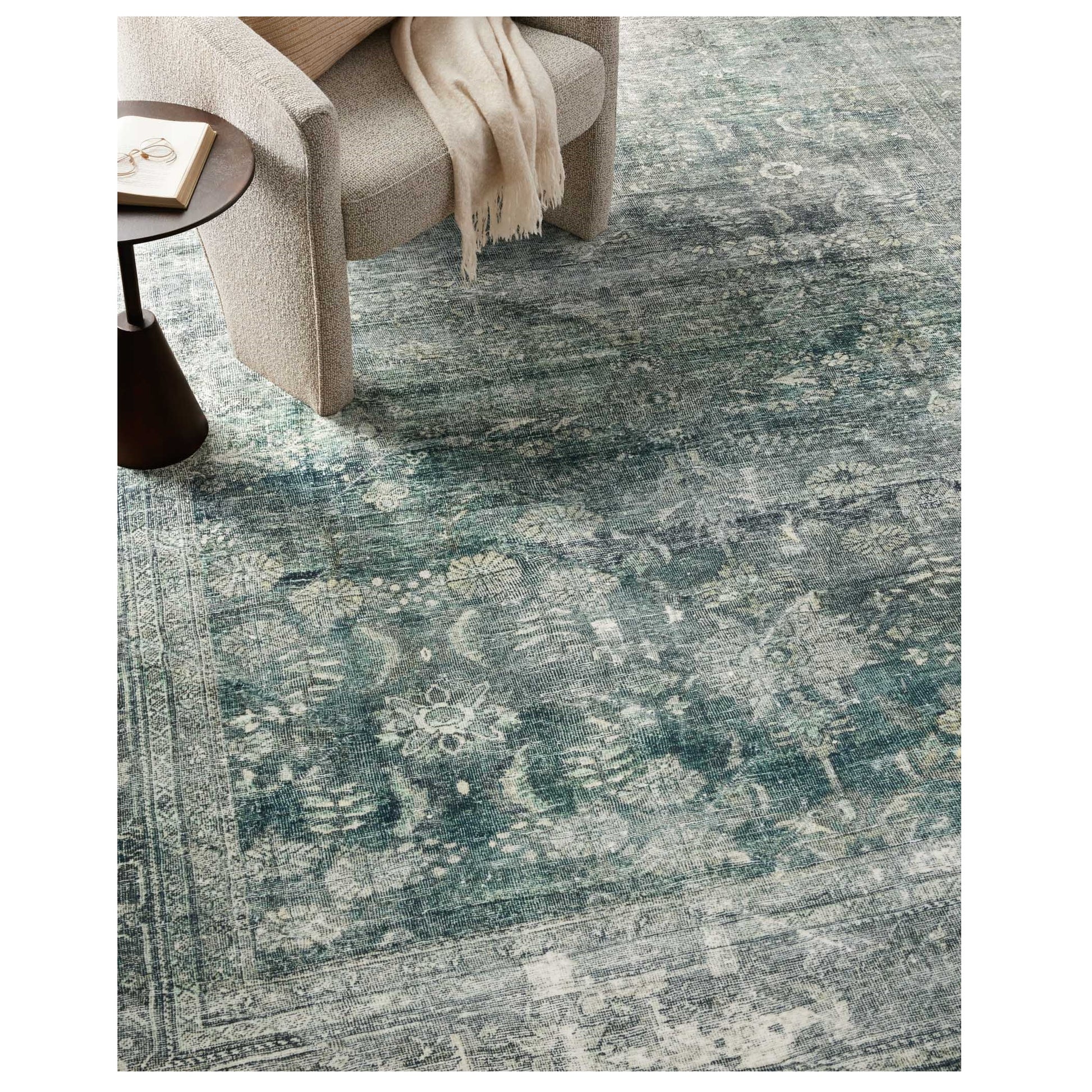 Banks Blue Lagoon Rug under a chair
