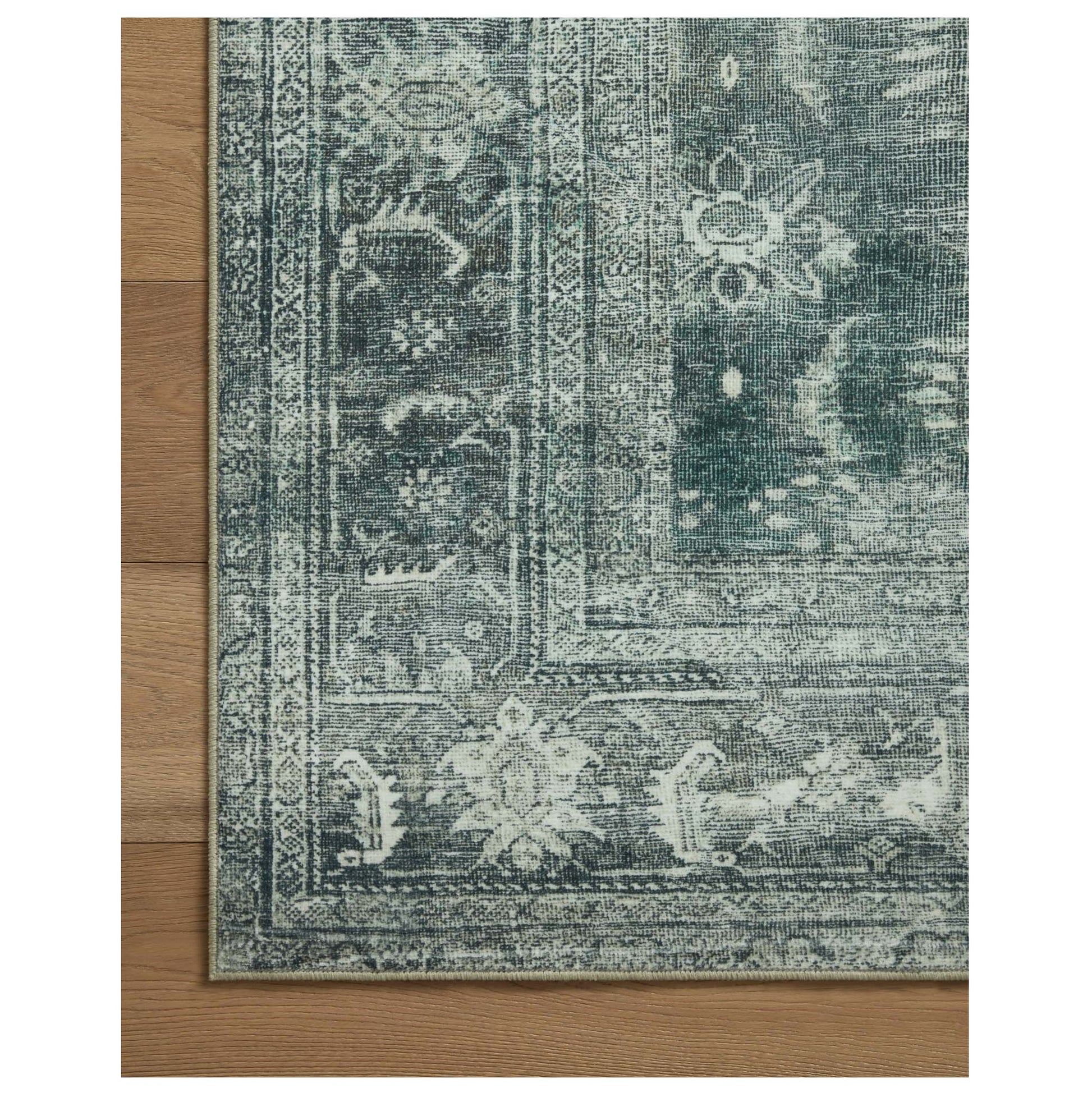Banks Blue Lagoon Rug corner on wood floor