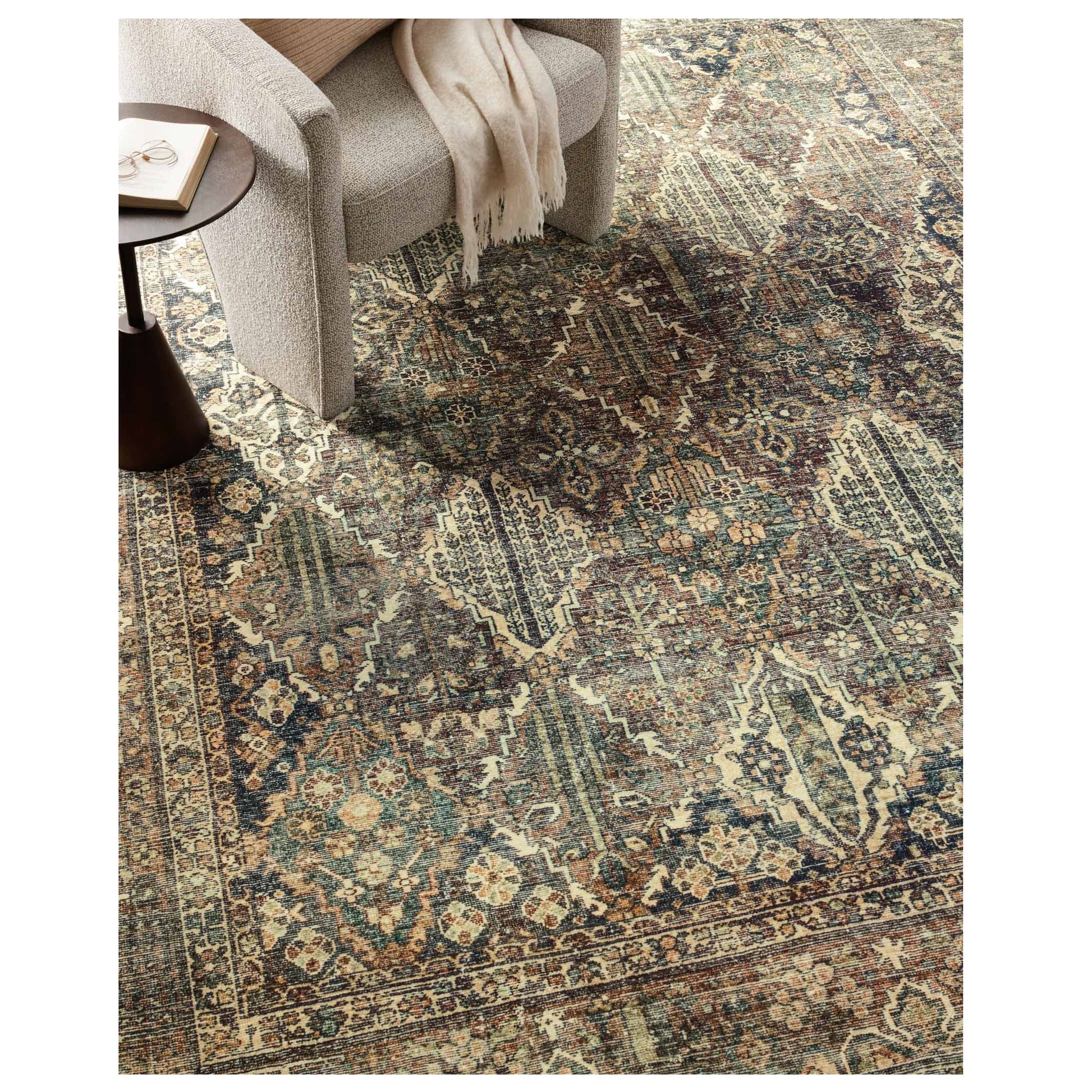 Banks Spice Blue Rug under a chair