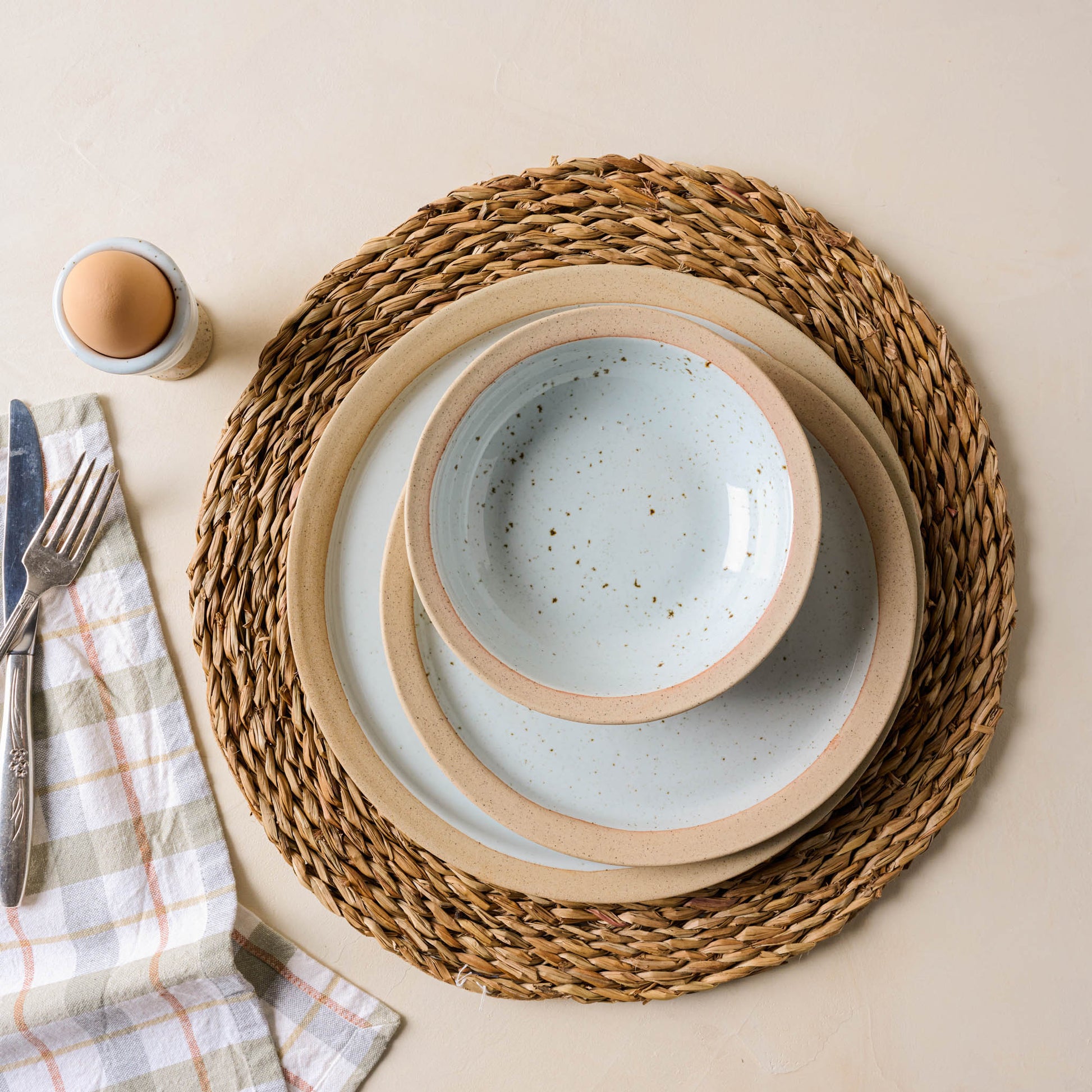 lucian round placemat with Lillia serveware on top