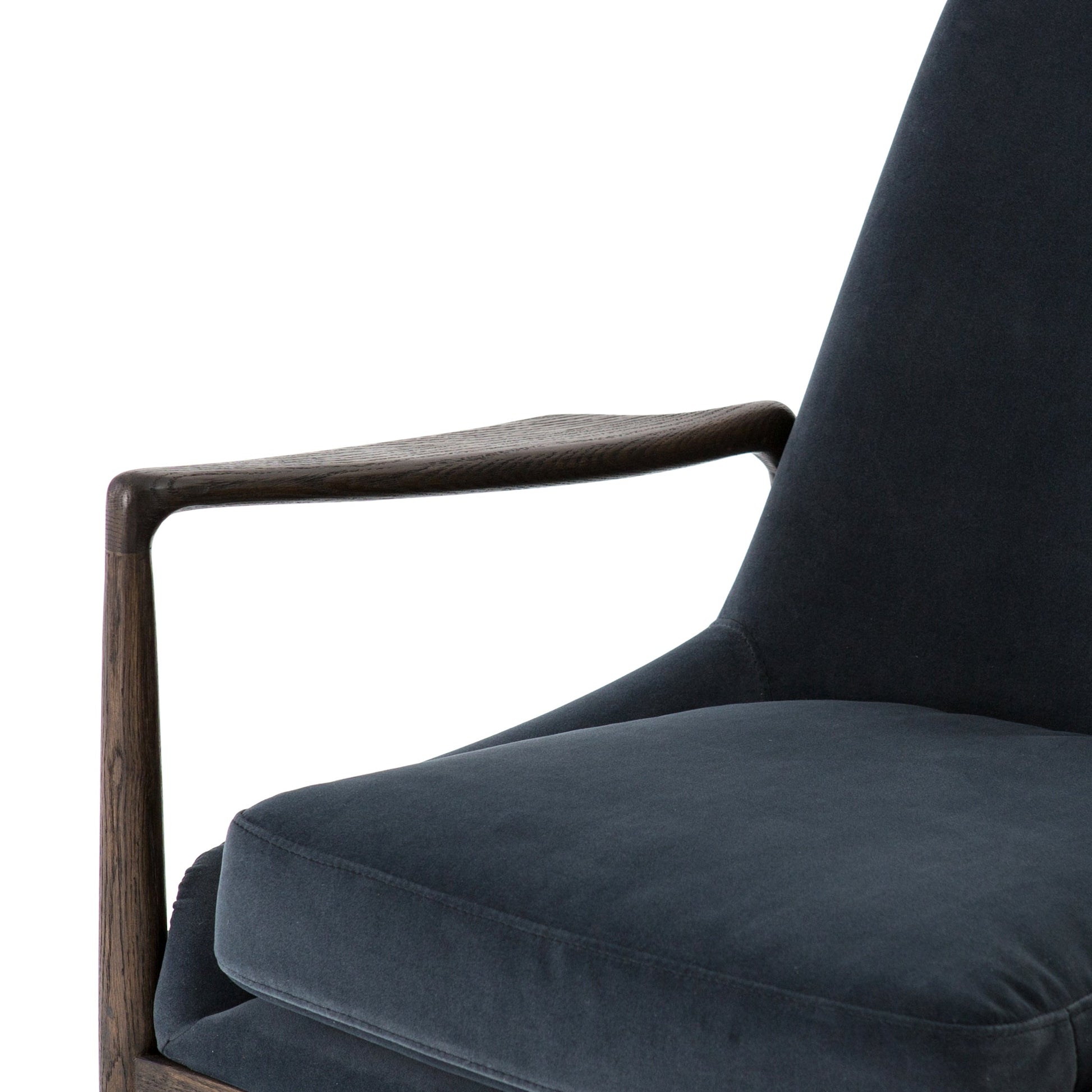dark grey suede mid century modern arm chair with wooden arms and legs