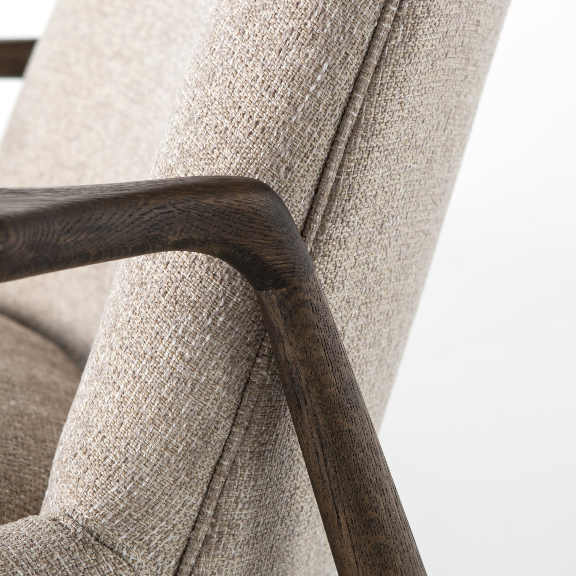 cream fabric mid century modern arm chair with wooden arms and legs