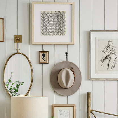 Figure Sketch II on wall with hanging hat and mirror