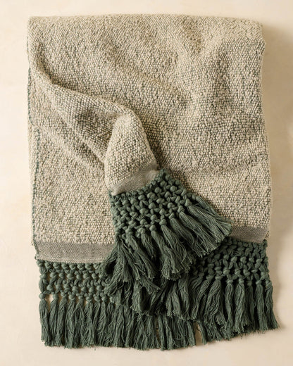 Dusty Green Tassel Throw with dark green tassels 