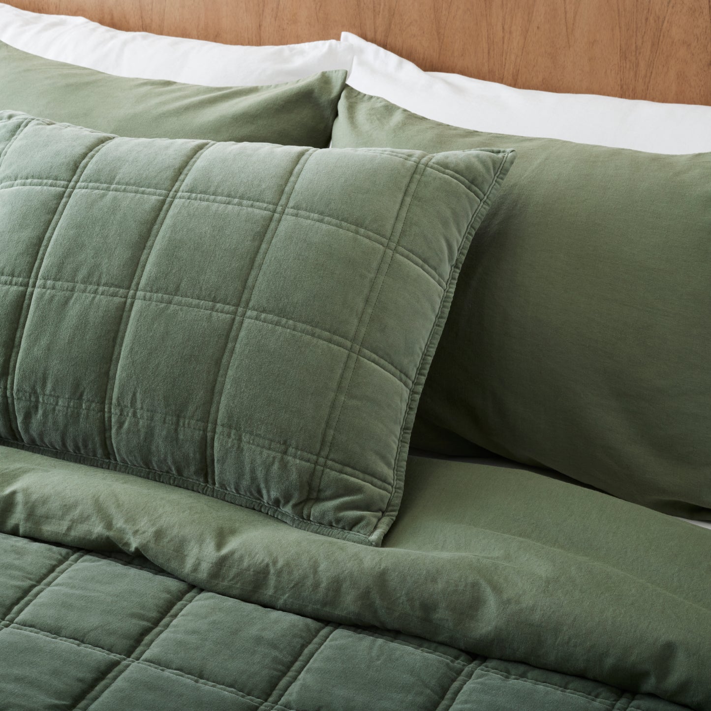 Weekend Velvet Quilt - Dusty Green and matching sham on made bed