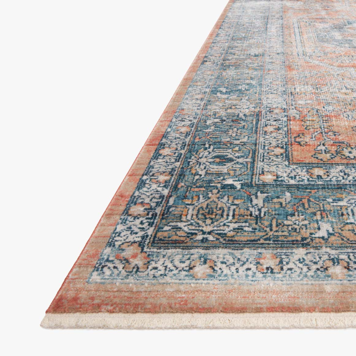 blue and coral orange traditional style rug with floral patterns and detail