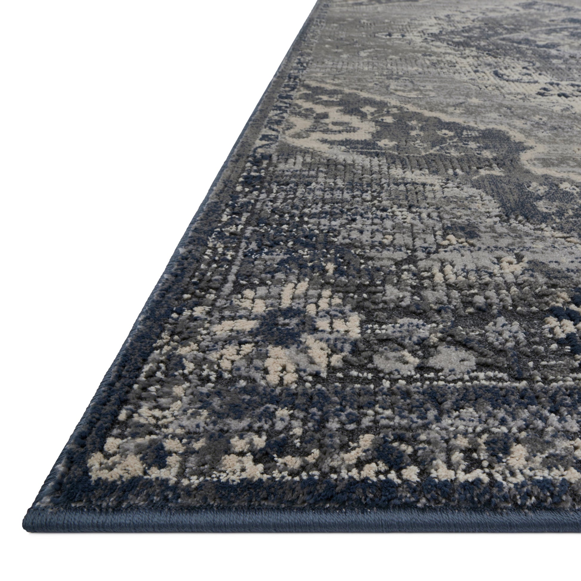 dark grey and silver rug with traditional pattern