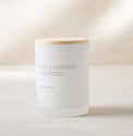 magnolia greenhouse candle with wood lid notes scents of cucumber thyme and melon