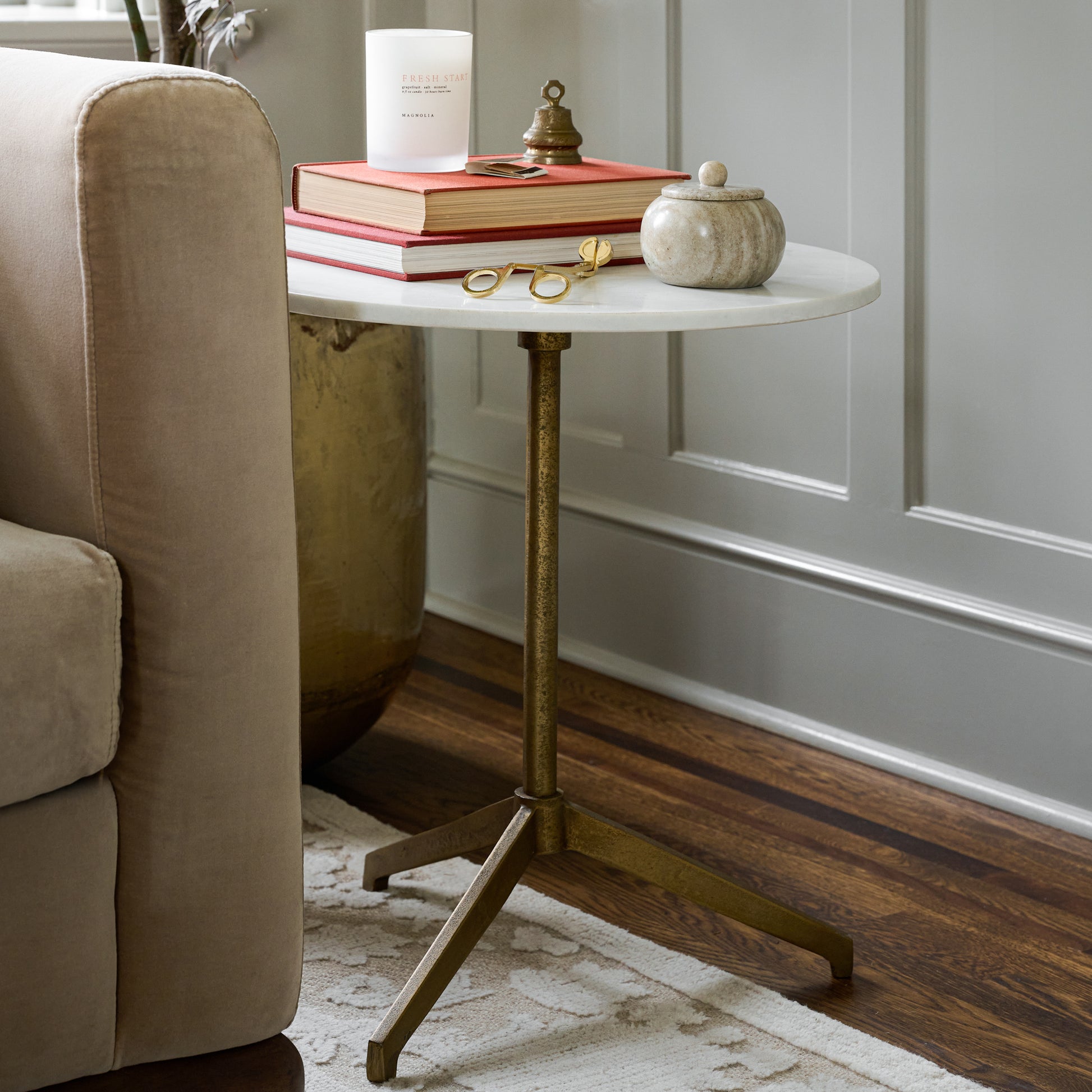 Selena End Table with books and candle on top