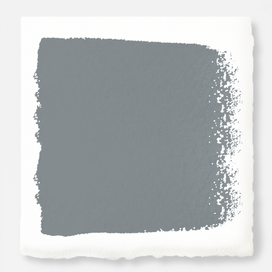 A dark gray with blue undertones door and cabinet paint named deep rock